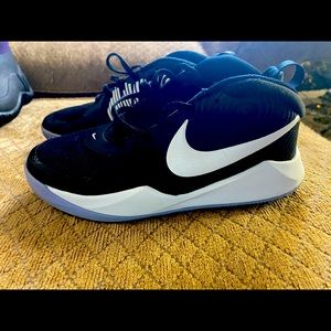 Girls purple and black Nike basketball shoes Size 5